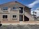 Apartment exterior features a balcony and private stairwell at 1505 Frank Aved St # 101, Las Vegas, NV 89110