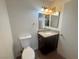 Bathroom with a toilet and vanity with granite countertop at 1505 Frank Aved St # 101, Las Vegas, NV 89110