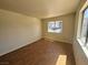 A bedroom with tile floors and a large window at 1505 Frank Aved St # 101, Las Vegas, NV 89110