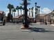 Community building at gated entrance with mailbox and palm trees at 1505 Frank Aved St # 101, Las Vegas, NV 89110