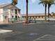 Gated community entrance with palm trees and easy access at 1505 Frank Aved St # 101, Las Vegas, NV 89110