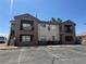 Exterior shot of apartment buildings with balcony access and private stairwells at 1505 Frank Aved St # 101, Las Vegas, NV 89110