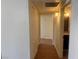 Hallway with multiple doors, and tile flooring at 1505 Frank Aved St # 101, Las Vegas, NV 89110