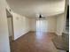 Bright living room featuring tile floors, a ceiling fan, and sliding glass door to the outside at 1505 Frank Aved St # 101, Las Vegas, NV 89110