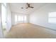 Bright bedroom with a vaulted ceiling, a bay window and neutral carpet at 1519 Deerford Cir, Las Vegas, NV 89110