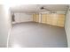 Three-car garage features epoxy floors, finished walls, and ample storage space at 1519 Deerford Cir, Las Vegas, NV 89110
