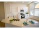 Bright kitchen featuring white countertops and cabinets at 1519 Deerford Cir, Las Vegas, NV 89110