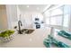 Kitchen island featuring white countertops and sink at 1519 Deerford Cir, Las Vegas, NV 89110