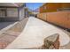 Spacious concrete side yard alongside house at 1519 Deerford Cir, Las Vegas, NV 89110