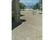 Backyard of the property featuring gravel cover, access, and functional equipment at 1611 Red Rock Dr, Pahrump, NV 89048