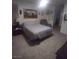 Spacious bedroom with carpet, ceiling fan and furniture at 1611 Red Rock Dr, Pahrump, NV 89048