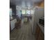 This cozy dining room is conveniently located next to the kitchen, perfect for Gathering meals at 1611 Red Rock Dr, Pahrump, NV 89048