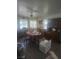 Traditional dining area with a ceiling fan, and decorative hutch at 1611 Red Rock Dr, Pahrump, NV 89048