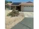 Charming single-story home featuring solar panels and a xeriscaped front yard for low maintenance at 1611 Red Rock Dr, Pahrump, NV 89048