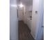 Hallway featuring a laundry area with a washer and dryer at 1611 Red Rock Dr, Pahrump, NV 89048