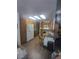 Bright kitchen featuring wood cabinets, modern appliances, and skylights providing ample natural light at 1611 Red Rock Dr, Pahrump, NV 89048