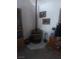 Picture of a cozy space enhanced by a corner wood stove, with tile flooring at 1611 Red Rock Dr, Pahrump, NV 89048