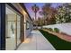 Backyard featuring a concrete patio, privacy wall with beautiful flowers and direct access to bathroom at 1616 Shadow Rock Dr, Las Vegas, NV 89117