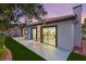 Backyard featuring a concrete patio, privacy wall with beautiful flowers and direct access to kitchen at 1616 Shadow Rock Dr, Las Vegas, NV 89117