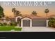 Charming single-story home featuring a tile roof, desert landscaping, and a spacious three-car garage at 1616 Shadow Rock Dr, Las Vegas, NV 89117