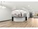 Modern open kitchen with stainless steel appliances, custom cabinets, and elegant countertop at 1616 Shadow Rock Dr, Las Vegas, NV 89117