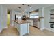 Bright kitchen featuring stainless appliances, a kitchen island with a butcher block top, and ample storage at 1917 Badger Canyon Ave, North Las Vegas, NV 89031