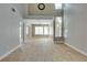 Spacious living room featuring tile floors, high ceilings, and large windows for plenty of natural light at 1917 Badger Canyon Ave, North Las Vegas, NV 89031