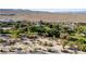 Aerial view showcasing playground, baseball field, and desert landscape at 1928 Las Palmas Ln # 228, Laughlin, NV 89029