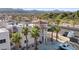 Condo with private balcony, surrounded by palm trees and desert landscaping at 1928 Las Palmas Ln # 228, Laughlin, NV 89029