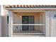 Balcony with direct access to unit, featuring stucco exterior and updated windows at 1928 Las Palmas Ln # 228, Laughlin, NV 89029