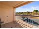 Balcony view overlooking desert landscaping and parking, with neutral color scheme at 1928 Las Palmas Ln # 228, Laughlin, NV 89029