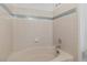 Bright bathroom featuring a tiled tub with a tiled wall at 1928 Las Palmas Ln # 228, Laughlin, NV 89029
