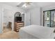 Bedroom featuring a bed, dresser with a TV, and a sliding glass door at 1928 Las Palmas Ln # 228, Laughlin, NV 89029