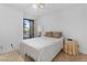 Bedroom with a bed, side table, and a window view at 1928 Las Palmas Ln # 228, Laughlin, NV 89029