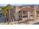 Charming two-story condo with a private balcony and staircase, surrounded by well-manicured landscaping at 1928 Las Palmas Ln # 228, Laughlin, NV 89029