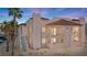 Charming condo features a stucco exterior, stairs to entry, and balcony perfect for enjoying the neighborhood views at 1928 Las Palmas Ln # 228, Laughlin, NV 89029