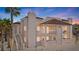 Charming condo features a stucco exterior, stairs to entry, and balcony perfect for enjoying the neighborhood views at 1928 Las Palmas Ln # 228, Laughlin, NV 89029