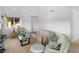 Bright living room with a fireplace, large windows, and comfortable seating, ideal for relaxation at 1928 Las Palmas Ln # 228, Laughlin, NV 89029