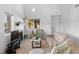 Bright living room with a fireplace, large windows, and comfortable seating, ideal for relaxation at 1928 Las Palmas Ln # 228, Laughlin, NV 89029