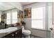 Bathroom featuring a vanity and decorative accents at 1942 Old Mill Ln, Henderson, NV 89014