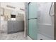 Bathroom featuring a large vanity and glass enclosed shower at 1942 Old Mill Ln, Henderson, NV 89014