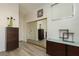 A modern bedroom featuring mirrored closet doors at 1942 Old Mill Ln, Henderson, NV 89014