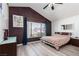 Spacious bedroom with a modern ceiling fan and natural light at 1942 Old Mill Ln, Henderson, NV 89014