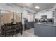 Eat-in kitchen featuring modern appliances, granite countertops, and ample cabinet space at 1942 Old Mill Ln, Henderson, NV 89014