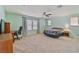 The bedroom features carpeted flooring, natural light, and ceiling fan at 2037 Brush Stroke St, Henderson, NV 89044