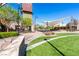 Inviting community center with modern architecture, outdoor seating, and well-maintained landscaping at 2037 Brush Stroke St, Henderson, NV 89044