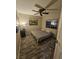 Bedroom with ceiling fan and wood-look floors at 2077 Alki Beach Ave, Laughlin, NV 89029