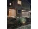 Well-lit, two-story house boasting a two-car garage and manicured rock garden at 2077 Alki Beach Ave, Laughlin, NV 89029