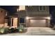 A well-lit home at nighttime at 2077 Alki Beach Ave, Laughlin, NV 89029