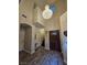 Bright foyer features high ceilings, laminate flooring, and modern light fixtures at 2077 Alki Beach Ave, Laughlin, NV 89029